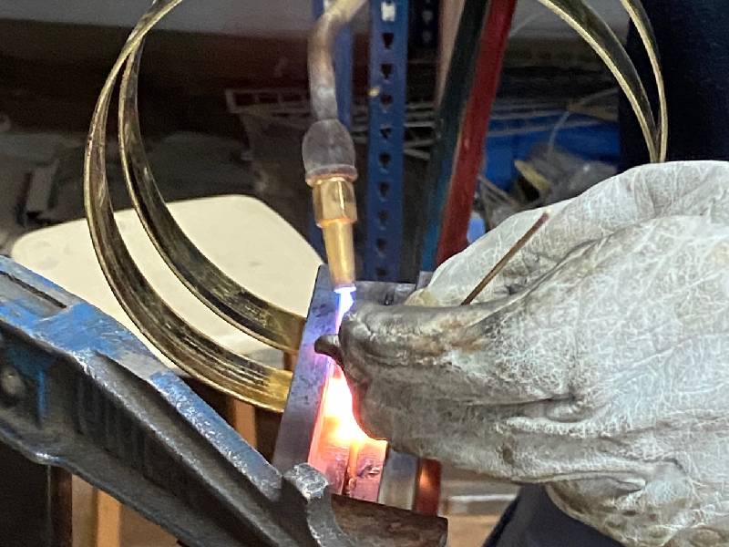 Taller bronce